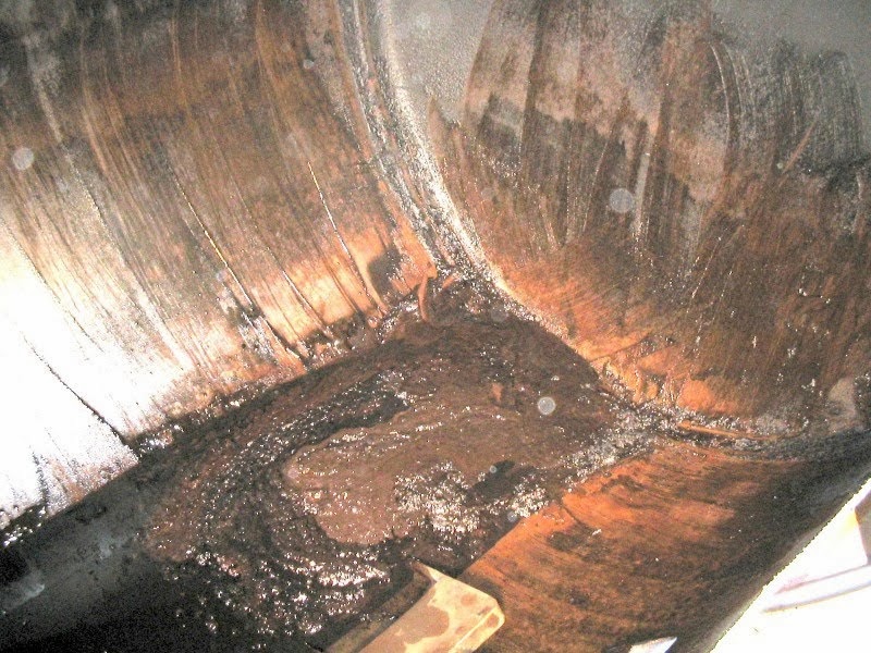 Avant la neutralisation, nettoyer la cuve à huile